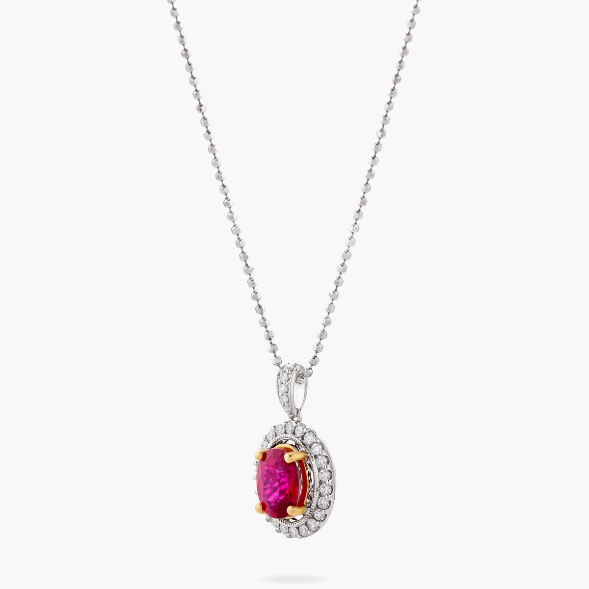 Ruby and Diamond Oval Halo Pendant Necklace