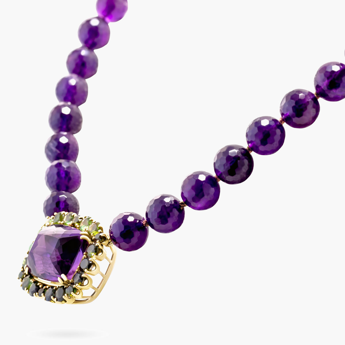 Amethyst & green tourmaline pendant on amethyst beads
