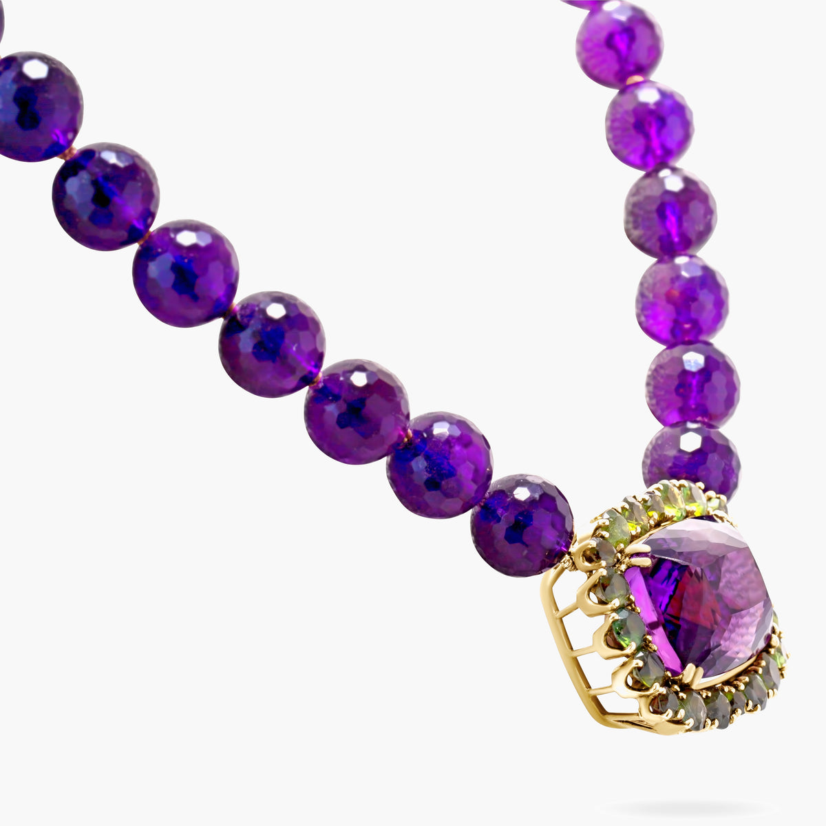Amethyst & green tourmaline pendant on amethyst beads